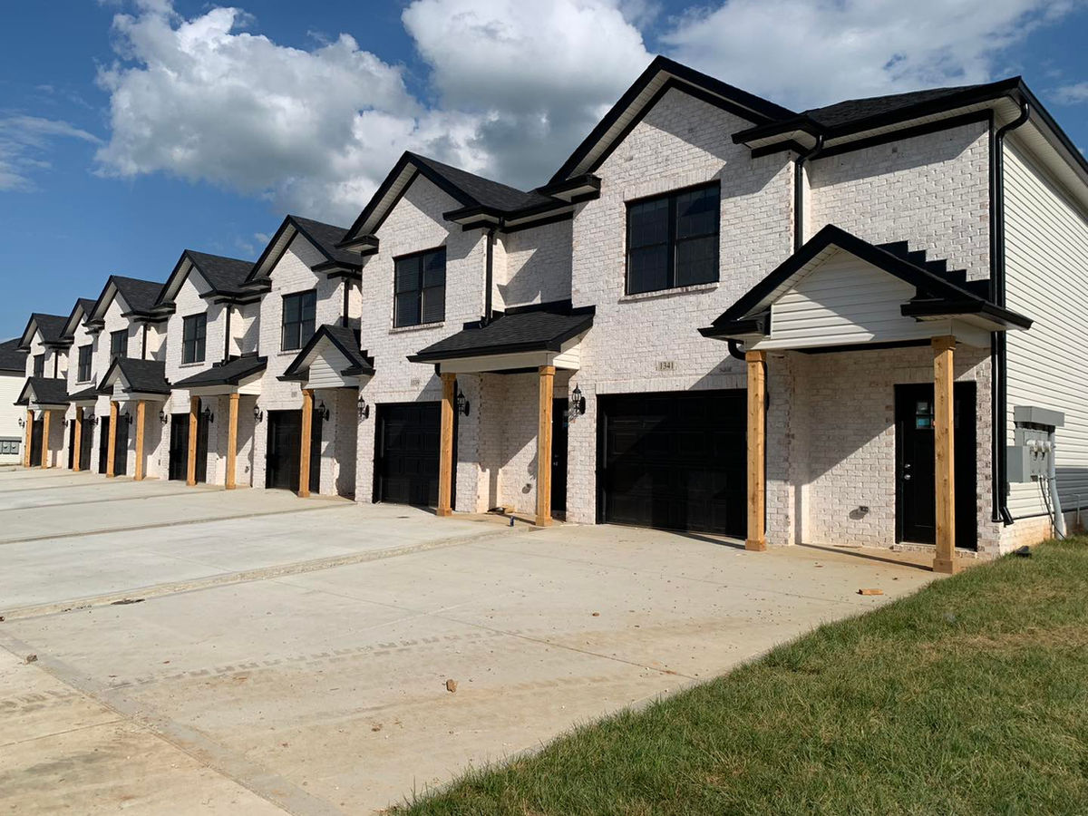 Townhome garage doors installed by EZ Open for a Kentucky builder
